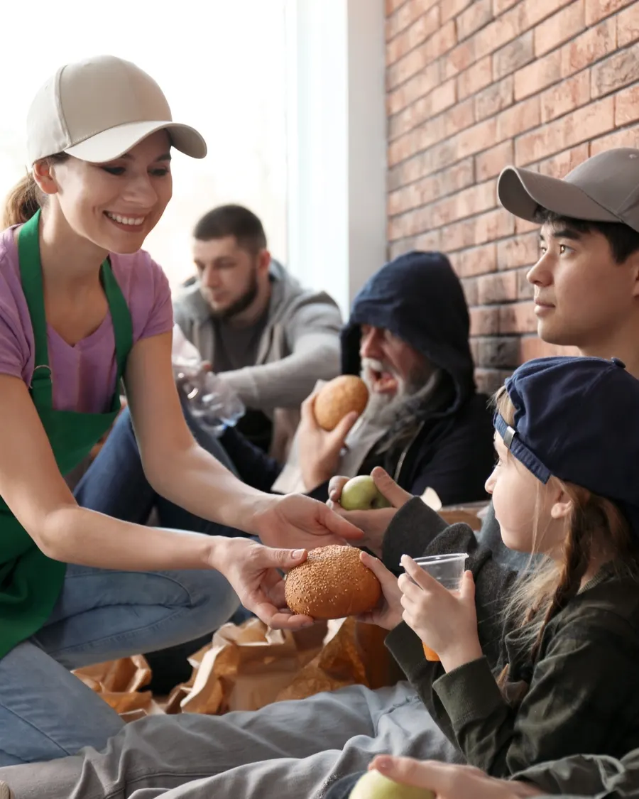 Children receiving comfort items at an Unbreakable Kids event