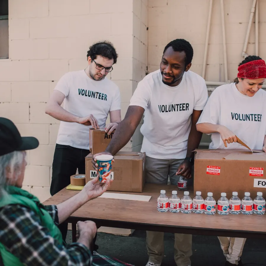 Volunteers sorting donated supplies for distribution to partner organizations